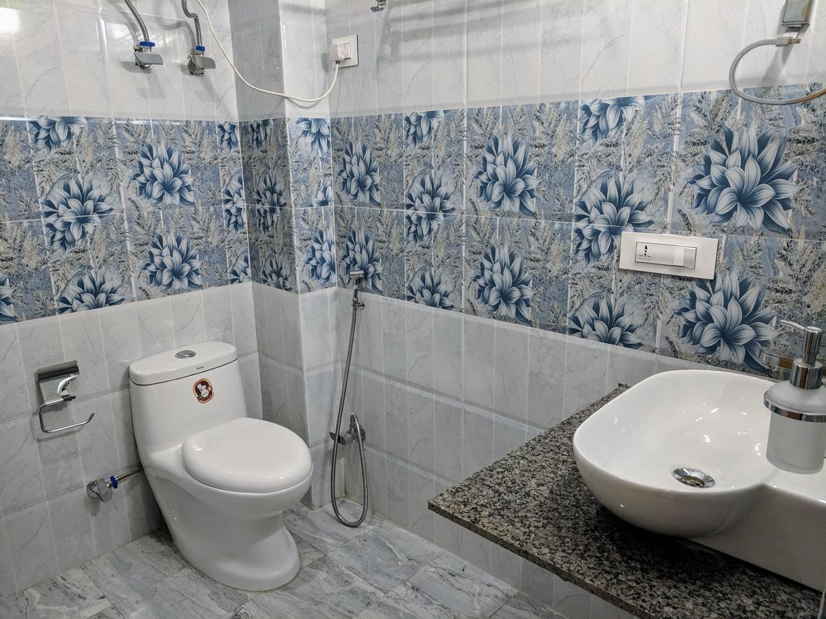 Fabhotel Rakus Place